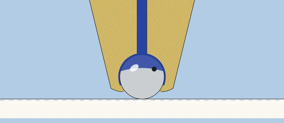 The tip cut open: the ball, its socket, the lip and the ink channel