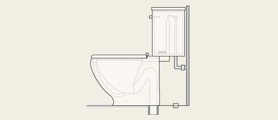 The toilet cut in half, with the bent pipe